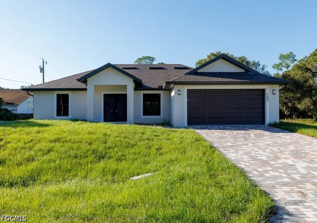 Photo 1 of Single family home for sale at 705 W 10th Street, Lehigh Acres, FL 33972 | MLS# 2026043253 | Listing updated on 2026-10-17