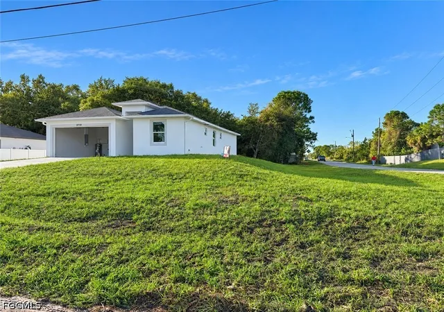Photo 2 of Sale Pending at 2719 28th Street W, Lehigh Acres, FL 33971 | MLS# 2026043290 | Listing updated on 2026-10-27