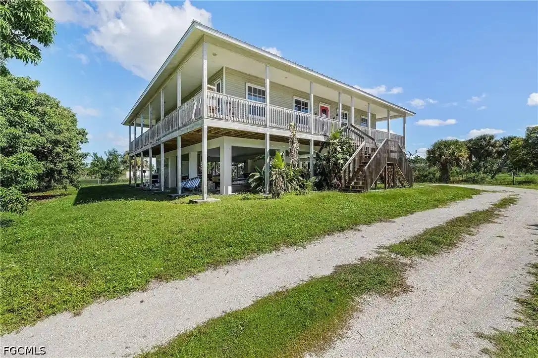 Single family home for sale at 13260 Morningstar Ln, Bokeelia, FL 33922 | MLS# 2026043334