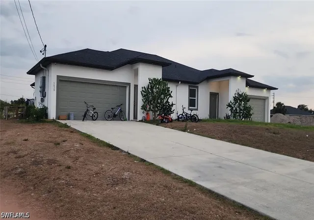 Photo 1 of Multi family home for sale at 5039/5041 Benton St, Lehigh Acres, FL 33971 | MLS# 226037255 | Listing updated on 2026-10-14