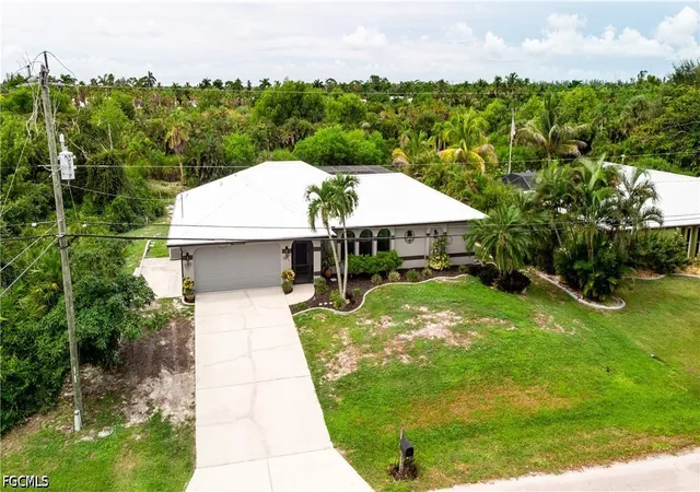 Single family home for sale at 11553 Oakland Dr, Bokeelia, FL 33922 | MLS# 2026043453