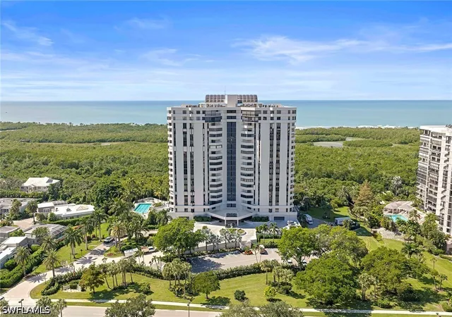 Listing Photo 1 - Condo for sale in building located at 6001 Pelican Bay Blvd, Naples, FL 34108 - Unit #1506
