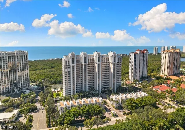 Listing Photo 1 - Condo for sale in building located at 7117 Pelican Bay Blvd, Naples, FL 34108 - Unit #1201