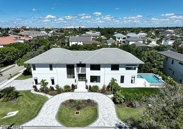Single family home for sale at 9100 Vanderbilt Dr, Naples, FL 34108 | MLS# 226037308