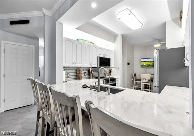 Photo 1 of Condo for sale at 14320 Bristol Bay Pl #205, Fort Myers, FL 33912 | MLS# 2026043701 | Listing updated on 2026-10-29