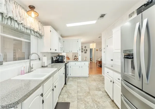 Photo 4 of Manufactured home for sale at 9749 Sugarberry Way, Fort Myers, FL 33905 | MLS# 226033474 | Listing updated on 2026-10-30
