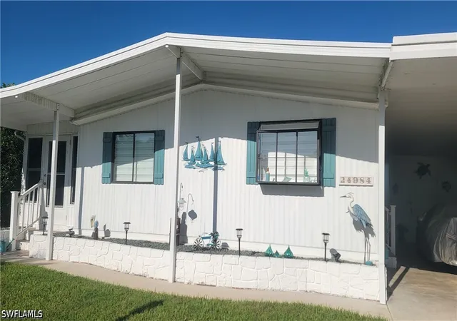 Photo 3 of Manufactured home for sale at 24984 Windward Blvd, Bonita Springs, FL 34134 | MLS# 226037477 | Listing updated on 2026-10-19