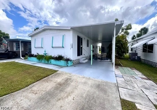 Photo 1 of Manufactured home for sale at 5518 Virginia Dare Ln, North Fort Myers, FL 33917 | MLS# 2026043978 | Listing updated on 2026-10-19