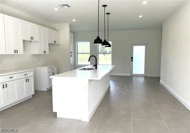 Photo 4 of Single family home for sale at 422 Eisenhower Blvd, Lehigh Acres, FL 33974 | MLS# 2026044046 | Listing updated on 2026-10-20