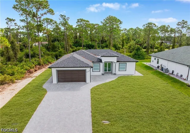 Single family home for sale at 333 Lownde Ave S, Lehigh Acres, FL 33974 | MLS# 2026044460