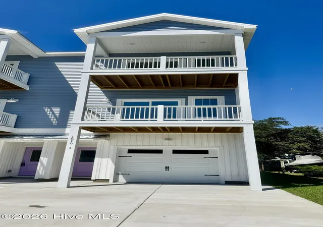 Photo 3 of Townhouse for sale at 1610 Swordfish Ln #1, Carolina Beach, NC 28428 | MLS# 100569966 | Listing updated on 2026-09-24