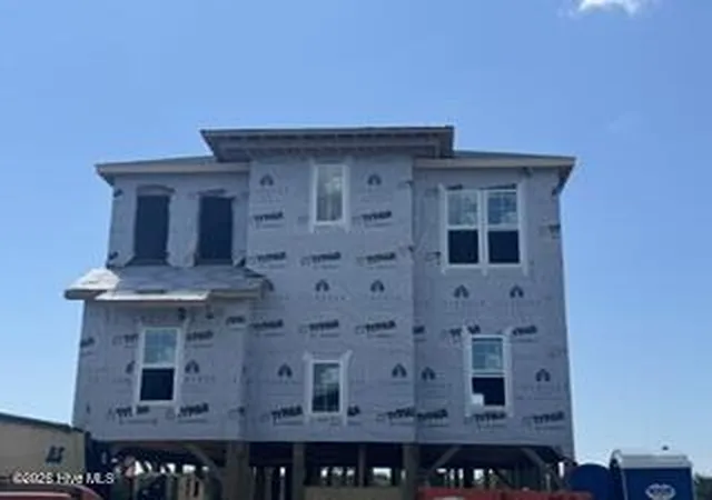 Photo 1 of Single family home for sale at 1401 E Beach Dr, Oak Island, NC 28465 | MLS# 100600694 | Listing updated on 2026-10-02