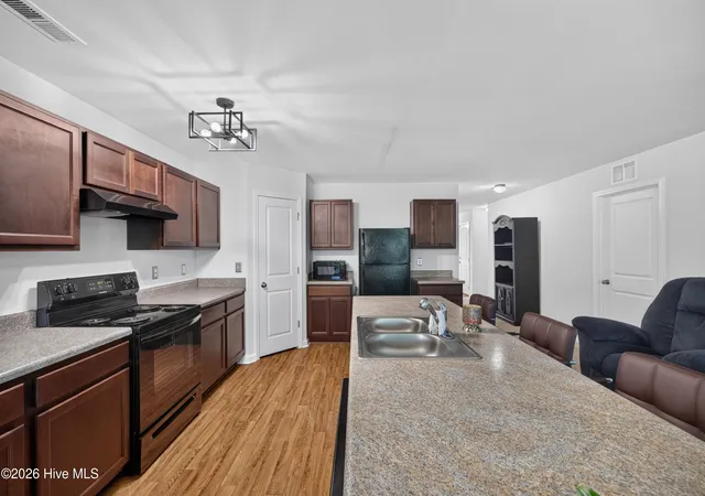 Photo 4 of Single family home for sale at 1559 W New Carraway Pl SE, Bolivia, NC 28422 | MLS# 100600965 | Listing updated on 2026-09-11