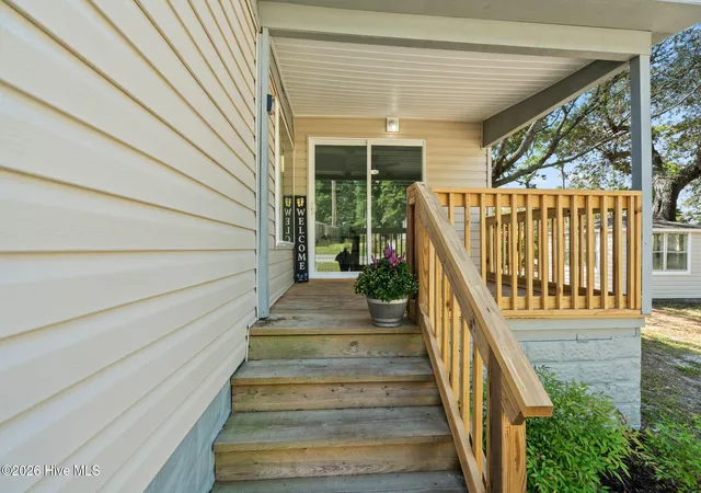 Photo 2 of Manufactured home for sale at 2305 N Bluebeard Trl Sw, Supply, NC 28462 | MLS# 100600028 | Listing updated on 2026-10-04