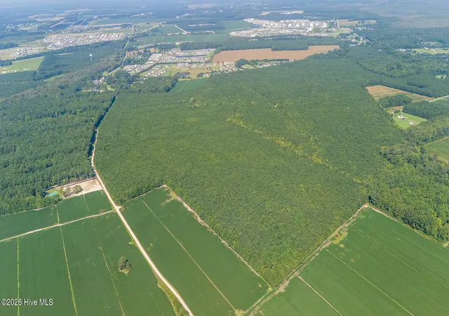 Photo 2 of Land for sale at Tbd Guinea Ml Rd, Moyock, NC 27958 | MLS# 100601052 | Listing updated on 2026-09-16