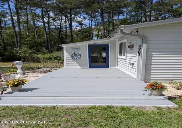 Photo 2 of Single family home for sale at 1203 Ocean Trl Ct Sw, Supply, NC 28462 | MLS# 100602077 | Listing updated on 2026-09-28