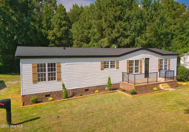 Photo 2 of Manufactured home for sale at 3163 Mobleys Brg Rd, Grimesland, NC 27837 | MLS# 100601971 | Listing updated on 2026-09-08