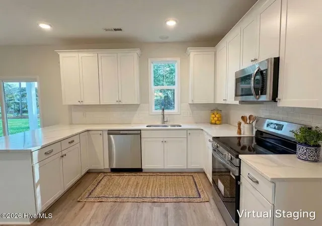 Photo 3 of Single family home for sale at 1026 Paddington Ave NE, Leland, NC 28451 | MLS# 100580672 | Listing updated on 2026-09-18