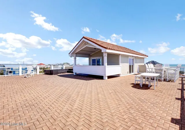 Photo 3 of Mansion for sale at 105 Bay Ct, N Topsail Beach, NC 28460 | MLS# 100602157 | Listing updated on 2026-09-09