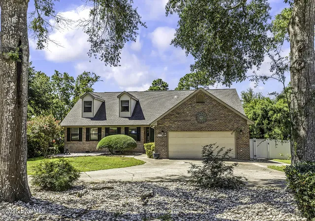 Photo 2 of Single family home for sale at 423 Lake Shore Dr, Sunset Beach, NC 28468 | MLS# 100602769 | Listing updated on 2026-09-20