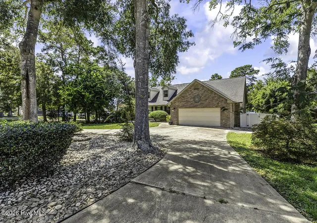 Photo 3 of Single family home for sale at 423 Lake Shore Dr, Sunset Beach, NC 28468 | MLS# 100602769 | Listing updated on 2026-09-20