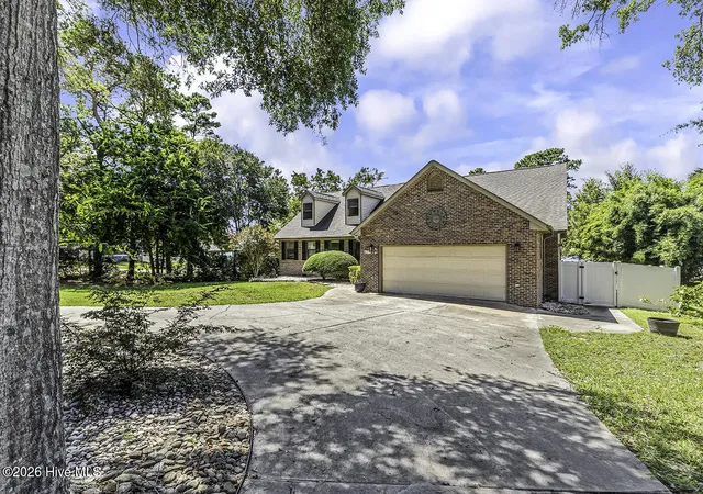 Photo 3 of Single family home for sale at 423 Lake Shore Dr, Sunset Beach, NC 28468 | MLS# 100602769 | Listing updated on 2026-09-20