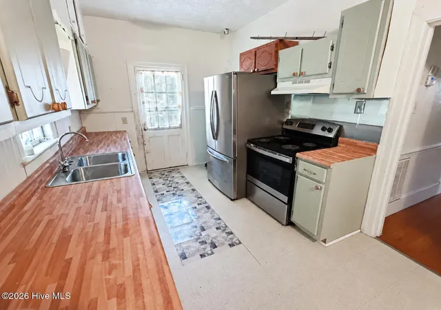Photo 6 of Single family home for sale at 411 Raleigh Rd Pkwy N, Wilson, NC 27893 | MLS# 100603130 | Listing updated on 2026-09-12