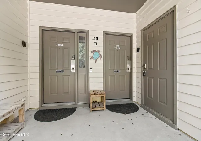Photo 2 of Townhouse for sale at 214 Kings Trl #B, Sunset Beach, NC 28468 | MLS# 100610230 | Listing updated on 2026-10-14
