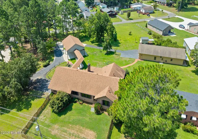 Photo 2 of Single family home for sale at 303 N Lincoln St, Benson, NC 27504 | MLS# 100559651 | Listing updated on 2026-09-22