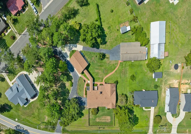 Photo 3 of Single family home for sale at 303 N Lincoln St, Benson, NC 27504 | MLS# 100559651 | Listing updated on 2026-09-22