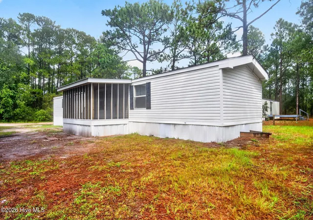 Photo 2 of Manufactured home for sale at 2771 Flamingo Dr Sw, Shallotte, NC 28470 | MLS# 100603228 | Listing updated on 2026-09-29