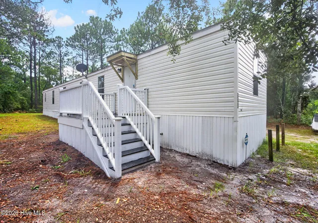 Photo 3 of Manufactured home for sale at 2771 Flamingo Dr SW, Shallotte, NC 28470 | MLS# 100603228 | Listing updated on 2026-09-29