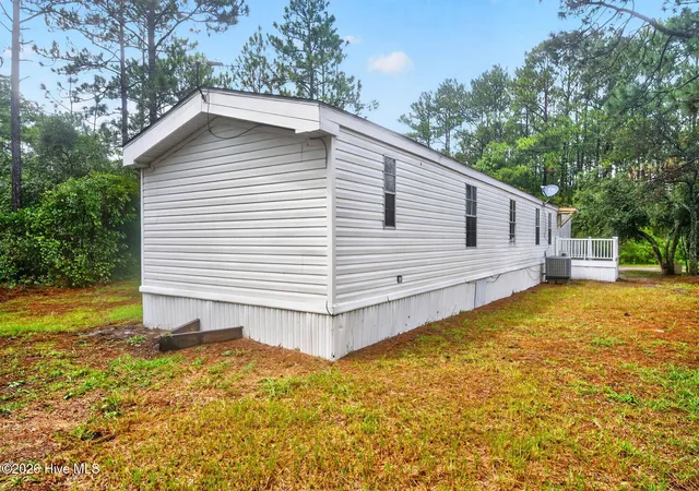 Photo 4 of Manufactured home for sale at 2771 Flamingo Dr SW, Shallotte, NC 28470 | MLS# 100603228 | Listing updated on 2026-09-29