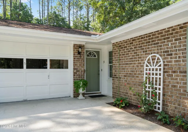 Photo 3 of Single family home for sale at 5 E Pine Ct, Carolina Shores, NC 28467 | MLS# 100602772 | Listing updated on 2026-09-17