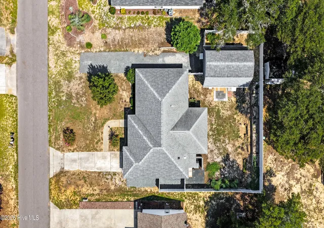 Photo 3 of Single family home for sale at 114 Ne 8th Street, Oak Island, NC 28465 | MLS# 100601553 | Listing updated on 2026-09-09