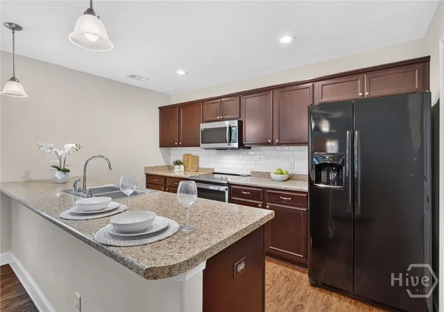 Photo 3 of Single family home for sale at 15 Glenmore Dr, Guyton, GA 31312 | MLS# SA365901 | Listing updated on 2026-10-26
