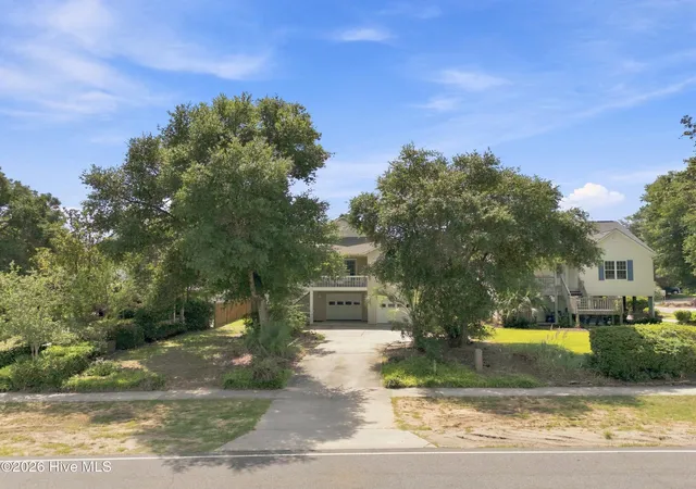 Photo 2 of Single family home for sale at 303 E Oak Is Dr, Oak Island, NC 28465 | MLS# 100602801 | Listing updated on 2026-10-06