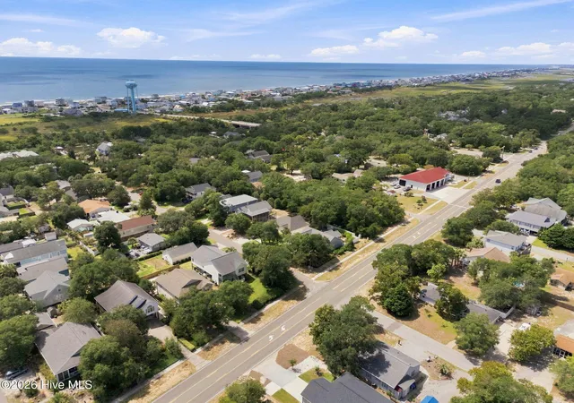 Photo 3 of Single family home for sale at 303 E Oak Is Dr, Oak Island, NC 28465 | MLS# 100602801 | Listing updated on 2026-10-06