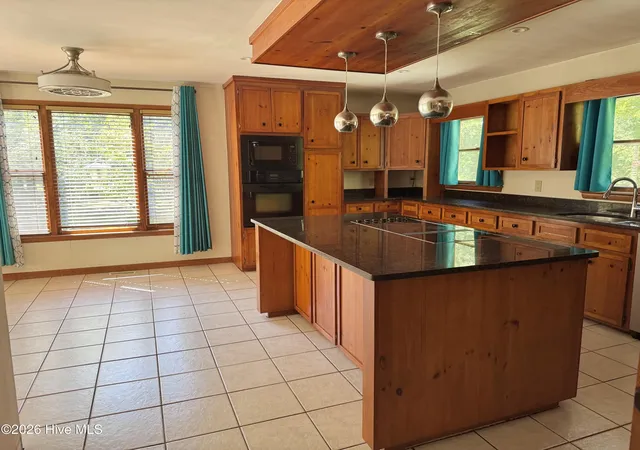 Photo 4 of Single family home for sale at 4710 Indian Corn Trl, Castle Hayne, NC 28429 | MLS# 100609740 | Listing updated on 2026-10-12