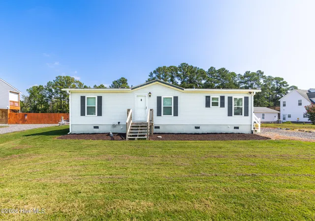 Photo 2 of Single family home for sale at 106 Trout St, Moyock, NC 27958 | MLS# 100601585 | Listing updated on 2026-09-30