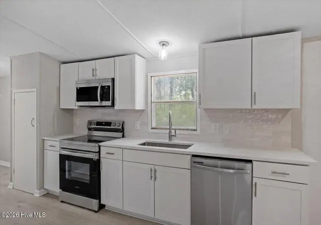 Photo 3 of Manufactured home for sale at 124 Decoy Dr, Pikeville, NC 27863 | MLS# 100602066 | Listing updated on 2026-09-08