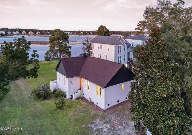 Photo 2 of Single family home for sale at 5802 E Yacht Dr, Oak Island, NC 28465 | MLS# 100602289 | Listing updated on 2026-09-22