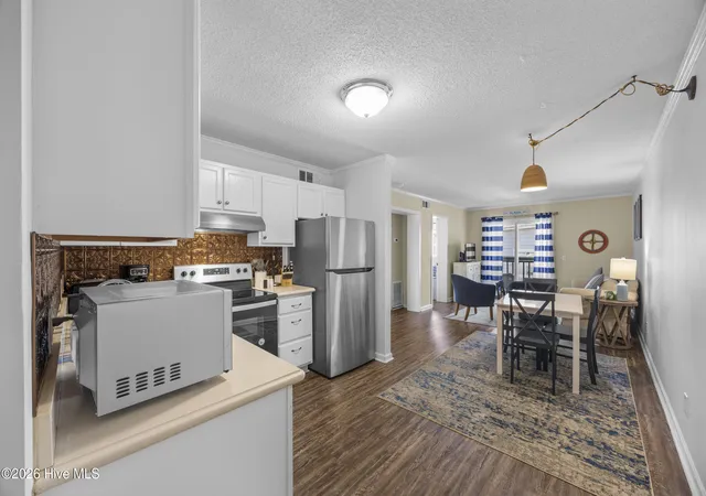 Listing Photo 5 - Condo for sale in building located at 1404 Canal Dr, Carolina Beach, NC 28428 - Unit #Apt 20