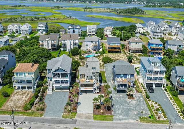 Photo 3 of Single family home for sale at 703 S Shore Dr, Surf City, NC 28445 | MLS# 100600583 | Listing updated on 2026-09-18