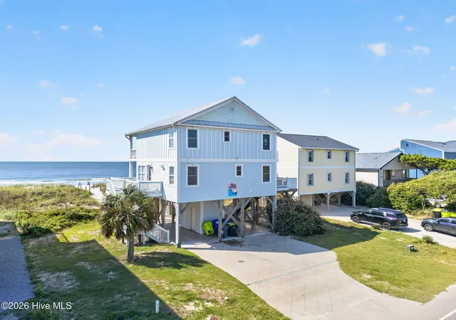 Photo 2 of Single family home for sale at 2319 W Beach Dr, Oak Island, NC 28465 | MLS# 100602439 | Listing updated on 2026-09-10
