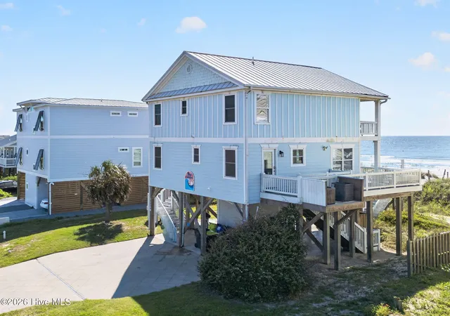 Photo 3 of Single family home for sale at 2319 W Beach Dr, Oak Island, NC 28465 | MLS# 100602439 | Listing updated on 2026-09-10