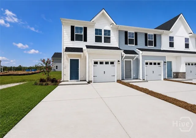 Photo 1 of Townhouse for sale at 122 Brunson Cir, Guyton, GA 31312 | MLS# SA358735 | Listing updated on 2026-09-09