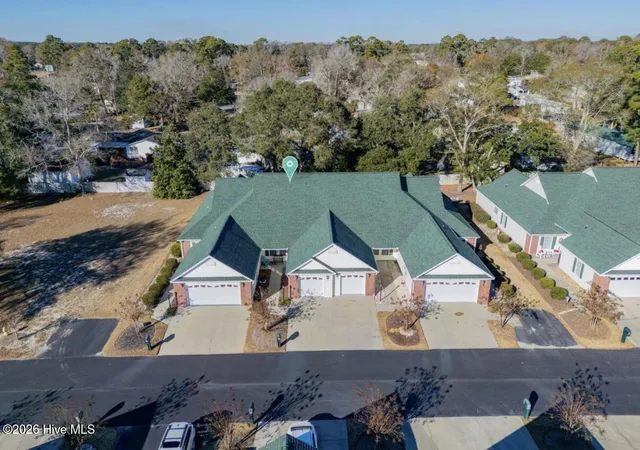 Photo 1 of Townhouse for sale at 404 Sunset Oaks Ln, Sunset Beach, NC 28468 | MLS# 100610457 | Listing updated on 2026-10-15