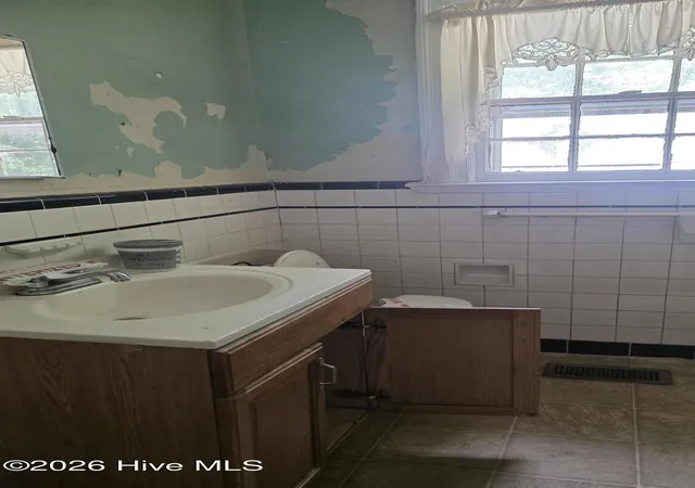 Photo 13 of Multi family home for sale at 404 High St, Rocky Mount, NC 27803 | MLS# 100602183 | Listing updated on 2026-09-10
