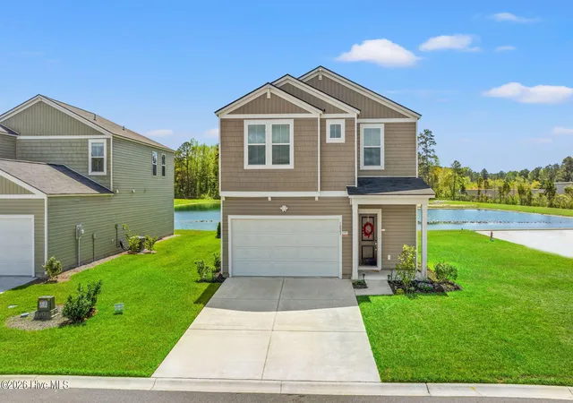 Photo 2 of Single family home for sale at 1023 Sawfish Dr Nw #99, Sunset Beach, NC 28468 | MLS# 100601886 | Listing updated on 2026-09-15